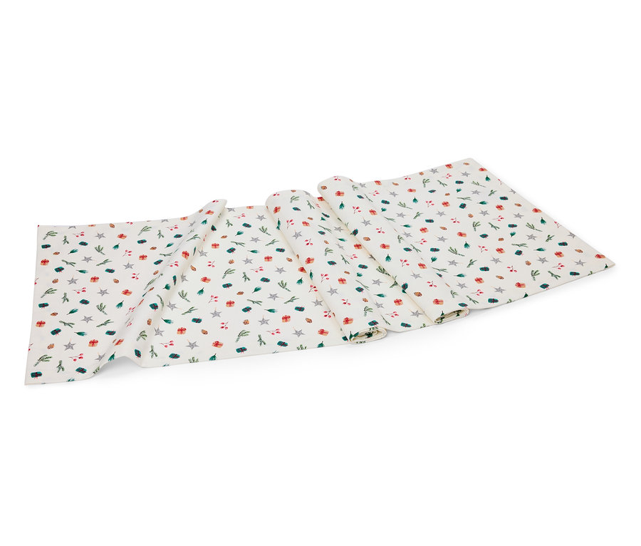 Yıldız, hediye ve dal desenli beyaz masa örtüsü.